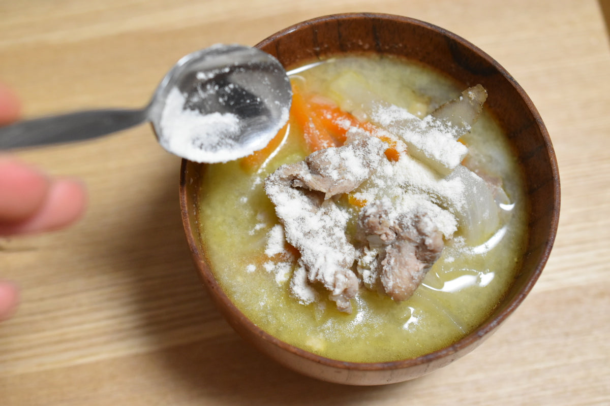 Yam powder sprinkled over a bowl of miso soup